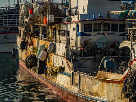 Fuji, Taiwan - October 03, 2016: Fishing boats of different size in Fuji Fishing Harbor. Fishing...