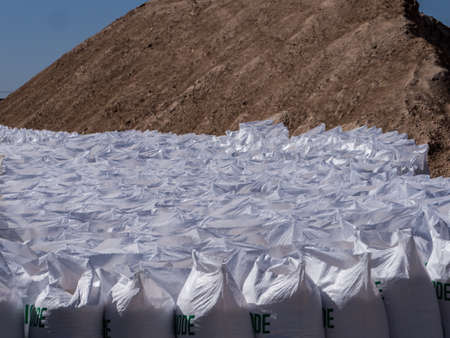 Lac Rose, Senegal, Africa (Pink Lake) - Feb 2019: Sacks of salt extracted from Retba Lake with red water. This is a UNESCO World Heritage Site. It is located north of the Cap Vert peninsula in Senegalのeditorial素材