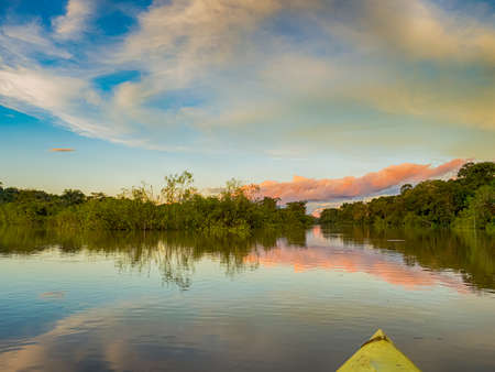 Amazon. Sunset view seen from the kayak. Coati Lagoon near the Javari River, the tributary of the...