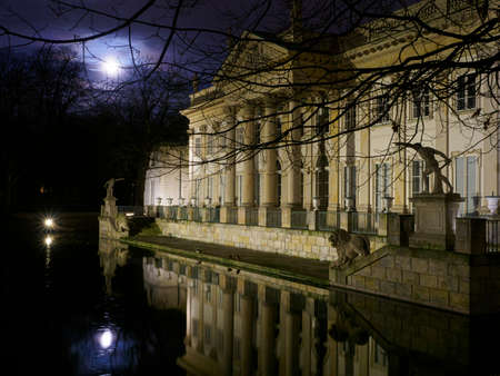 Warsaw, Poland - June 01, 2019: The northern faÃ§ade of the Palace on the Isle in Royal Baths Park in night tiem. Baths Park, Lazienki Park.のeditorial素材