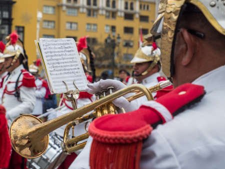 Lima, Peru - Dec, 2019: Guards of the Presidential Palace are giving a concert on the Plaza de Armas before changing of the guards ceremony. South America. Christmas Timeのeditorial素材