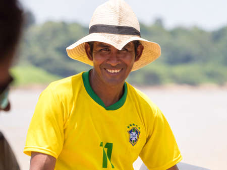 Santa Rita, Peru- Sep 2018: Portrait of a happy man in a hat, a local inhabitant of the Amazon...