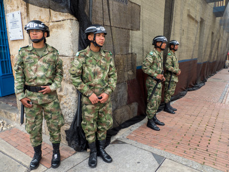 Bogota, Colombia - Nov, 2019: Armed riot police on the streets of BogotÃ¡, La Candelaria district. South Americaのeditorial素材