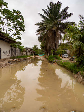Leticia, Colombia - November, 2019: Stree after the raint in small tropical town on the banks of the...