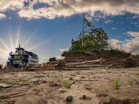Caballococha, Peru - Sep, 2019: Panoramic view of ferry boats on the bank of the Amazon River during...