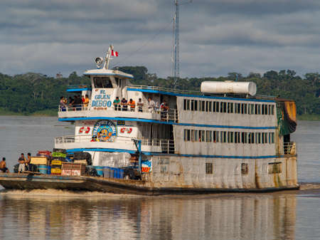 Amazon River, Peru - Dec 12, 2017: Cargo boat in the middle of Amazon river, Amazonia, South America