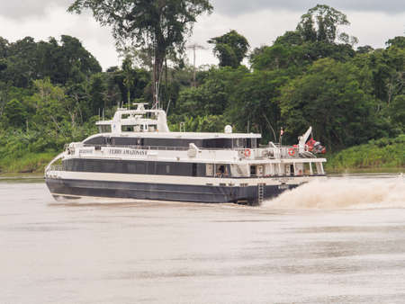 Pebas, Peru - Dec, 2017: Speed boat on the Amazon River. It transport people from Santa Rosa to...