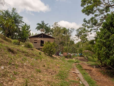 San Pedro, Brazil - Sep, 2017: Typical wooden house in the tropical Amazon forest. on the banks of the Javari River. Javari Valley, Amazonia. Latin America.のeditorial素材