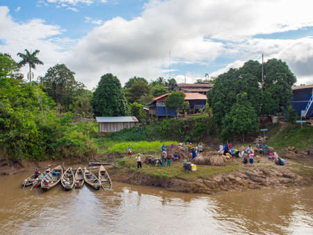 Amazon River, Peru - May, 2016: Small village on the bank of the Amazon River. Amazon. South America.のeditorial素材