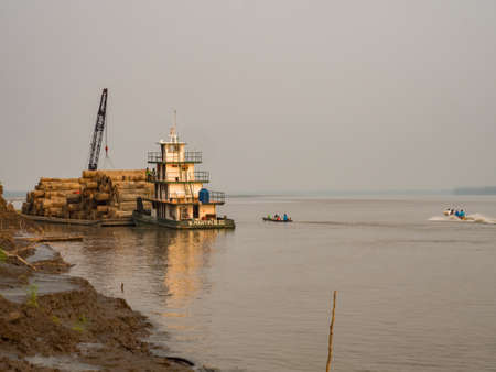 Santa Rosa, Peru - Sep, 2017: Sawmill on the river bank in the Amazon jungle. Amazon. Latin Americaのeditorial素材