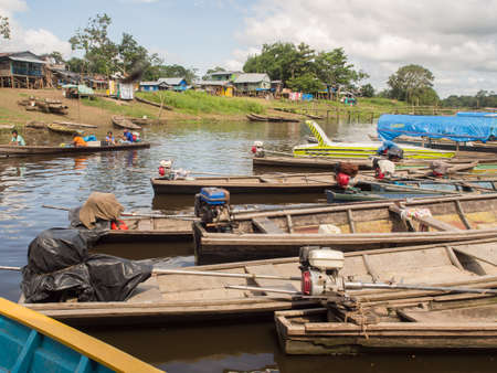 Leticia, Colombia - Dec 03, 2017: Traditional, Indian boats on the bank of the Amazon river. Amazon. South Americaのeditorial素材