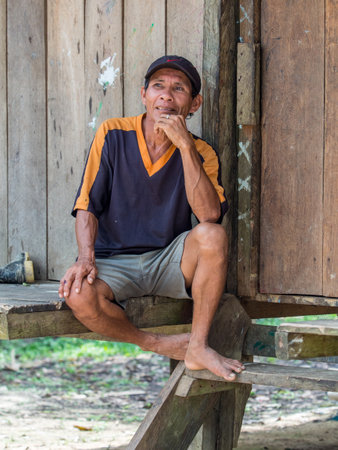 Santa Rita, Peru - Sep 2017: Portrait of a man, a local inhabitant of the Amazon rain forest. Amazonia, Latin America.のeditorial素材