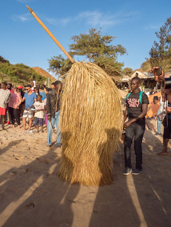 Dakar, Senegal - Feb, 2019: The Kumpo dance on the beach in Dakar. The Kumpo, Samay, and the Niasse are three traditional figures in the mythology of the Diola or Jola people in the Casamance. Africaのeditorial素材