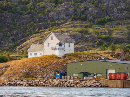 Bodo, Norway - August 20, 2019: White house and lighthouse on the hill. Nordland. Europe. Lofoten Gateの写真素材