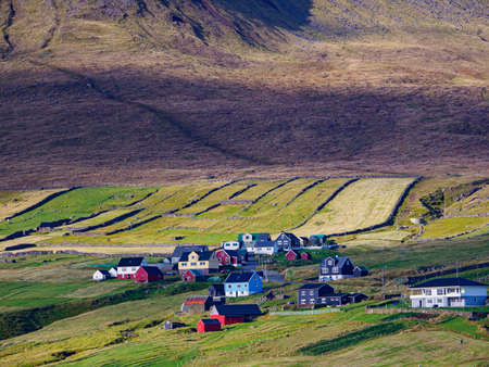 Faroe Islands, Denmark - Oct, 2020: Colorful wooden houses in the valley of the ViÃ°areyÃ°i village on ViÃ°oy island, Faroe Islands, Denmark North Europe.のeditorial素材