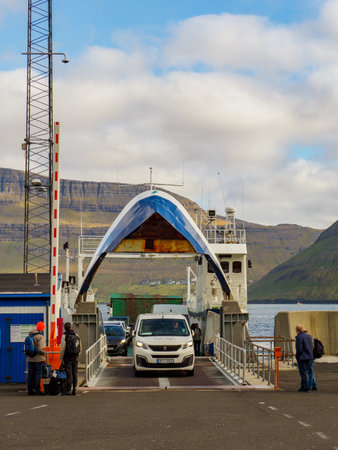 SyÃ°radalur, Denmark - Sep, 2020: Ferry to KlaksvÃ­k in the port in the village of SyÃ°radalur on the island of Kalsoy Faroe Islands. Northern Europeのeditorial素材