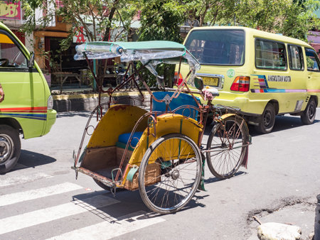 Ambon, Indonesia - Feb, 2018: Becaks, the traditional transportation in Indonesia. (Beca, Betjak,...