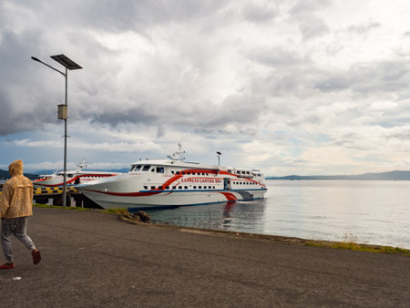 Ambon, Indonesia - February 15, 2018: A boat floating between the islands in the Maluki archipelago. Tulehu Port, Ambon Island, Maluku, Indonesia, Asiaのeditorial素材