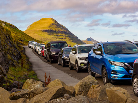 SyÃ°radalur, Denmark - Sep, 2020: Cars waiting for ferry to KlaksvÃ­k in the port in the village of SyÃ°radalur on the island of Kalsoy Faroe Islands. Northern Europeのeditorial素材