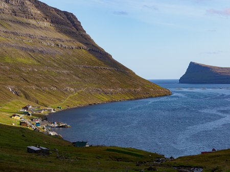 Faroe Islands, Denmark - Oct, 2020: Colorful wooden houses in the ÃrnafjÃ¸rÃ°ur village on BorÃ°oy island, Faroe Islands, Denmark North Europe.のeditorial素材