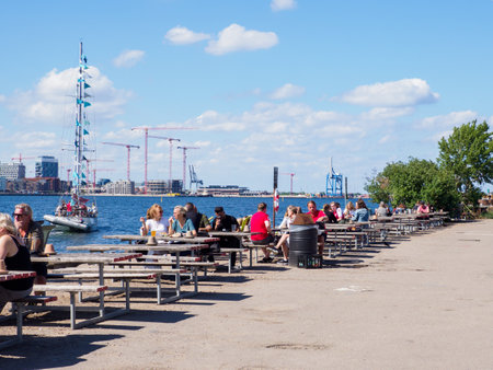 Copenhagen, Denmark - July 2021: Reffen - Copenhagen Street Food area over the sea. Europeのeditorial素材