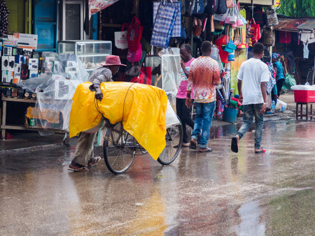 Zanzibar, Tanzania - Feb, 2021: The bicycle is a very popular means of transport in Africa, both for transporting people and various types of goods.. Covid time in Africa.のeditorial素材
