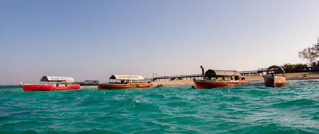Zanzibar, Tanzania - Jan, 2021: Boats mooring at Prison Island (also known as Changuu, Quarantine Island and Kibandiko). Today it is primarily an island of turtles. Africa.のeditorial素材
