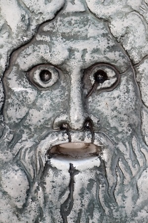 Close up of the reproduction of the famous Mouth of Truth of Rome
