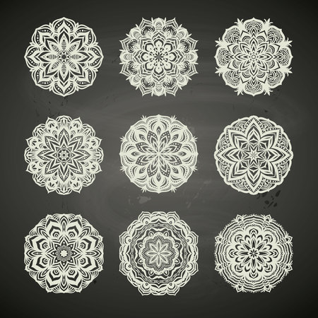 Circle lace ornament, round ornamental geometric pattern, snowflake decoration, chalkboard background etcのイラスト素材