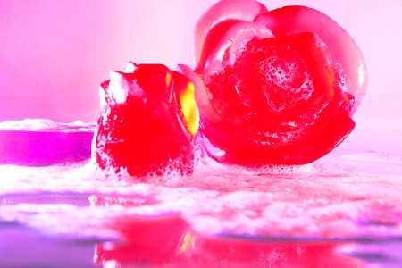 macro of glycerine soap with foam of pink and violetの写真素材