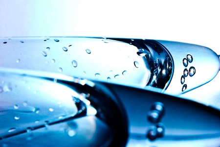 glass for champagne  on blue and red backgroundの写真素材