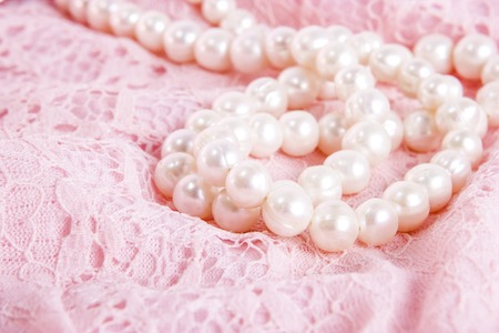  pearl on pink curve background. macro jewelryの写真素材