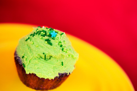 sweet dessert with green cream on plateの写真素材