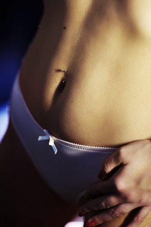 sexy part of woman body in the darkの写真素材