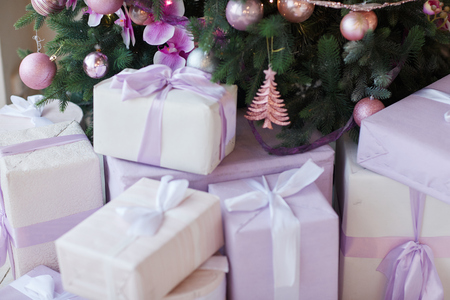 Christmas gifts of red colour. New Year backgroundの写真素材