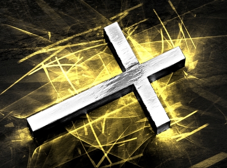 Silver Jesus cross shining, with golden causticsの写真素材