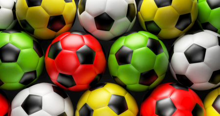 Soccer balls arranged in a rowの写真素材