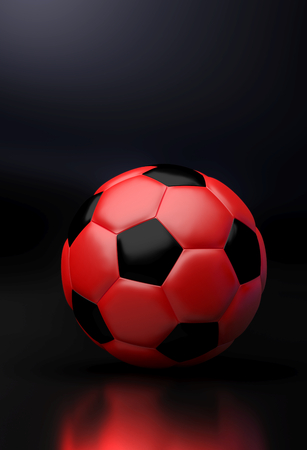 Background of a red soccer ball in portrait orientationの写真素材