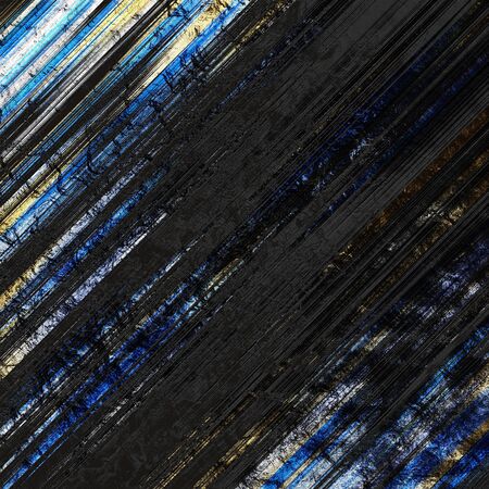 Decorative and metallic striped lines on a rough and black glossy background, dark blue and yeellow colored linesの写真素材