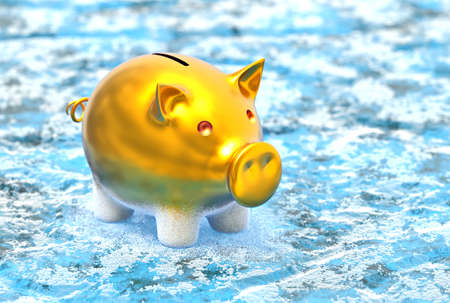 Frozen piggy bank standing on iceの写真素材