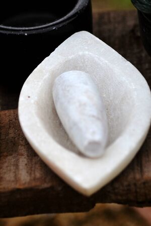 Kitchen utensils, granite mortar. grind seasoning.の写真素材