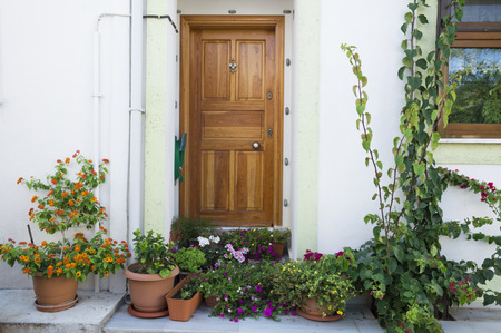 Canakkale, Turkey - September 11, 2014: View of a Aegean front entrance door of House in Bozcaada-Canakkale, Turkey. There are no people in the photograph.のeditorial素材