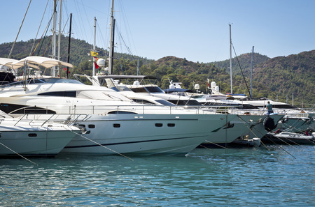 MuÄla, Turkey - September 10, 2013: Yatch and Sailboats moored at Aegean Sea. Beach of Dalyan at Mugla-Turkey.のeditorial素材