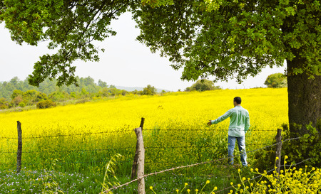 Man Standing in Field