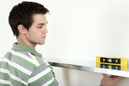 Man using spirit level