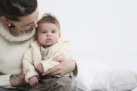 Woman holding babyの写真素材