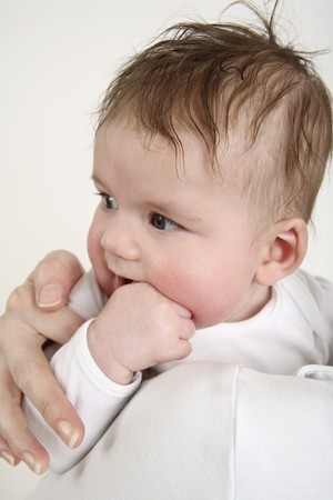 Close-up of woman carrying baby