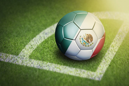 Taking a corner with Mexico flag soccer ballの写真素材