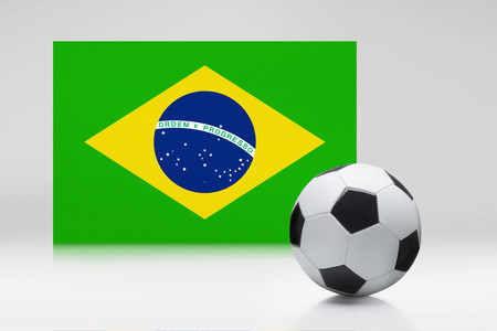 Brazil flag with a soccer ballの写真素材