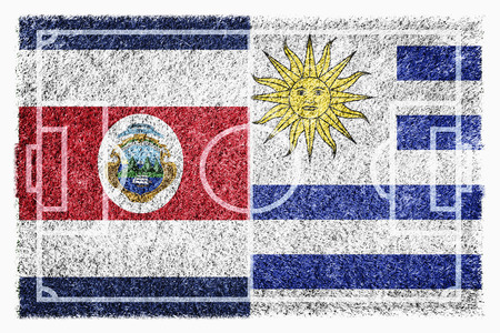 Flags of Costa Rica and Uruguay on soccer fieldの写真素材